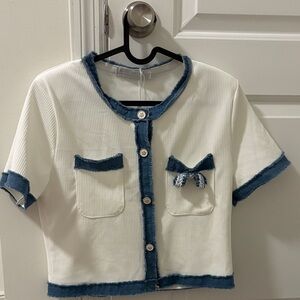 Chic White Top with Blue Trim